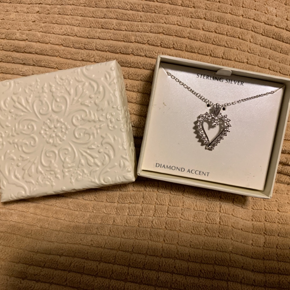 Sterling silver and diamond necklace. Never worn. Perfect condition.